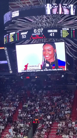 Crowd Erupts as Zaya Wade Appears on Jumbotron at Father's Retirement Ceremony in Miami