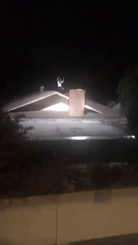 Suspect Fleeing From Police Climbs Onto Roof of LA Home