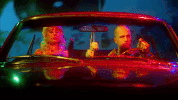 couple driving GIF