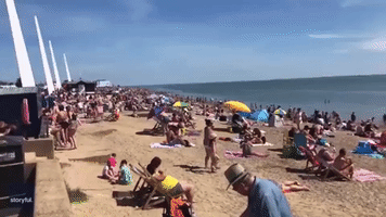 Crowds of People Ignore Social Distancing Guidelines and Gather on Southend Beach