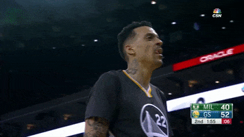 Sports gif. Matt Barnes nods "yes" and gestures, pointing both index fingers down toward the floor.