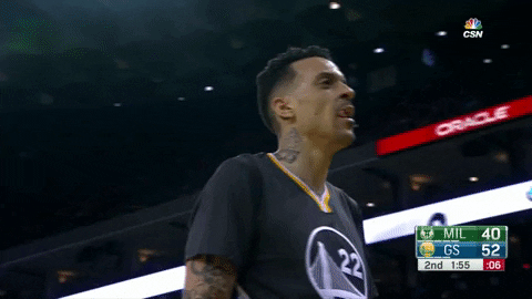 Sports gif. Matt Barnes nods "yes" and gestures, pointing both index fingers down toward the floor.