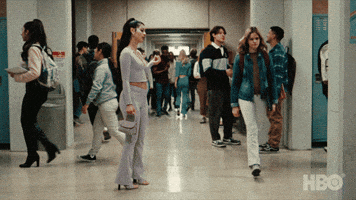 TV gif. Alexa Demie as Maddy on Euphoria in the middle of busy high school hallway, looking surprised and pissed off as she pivots from one foot to the other.