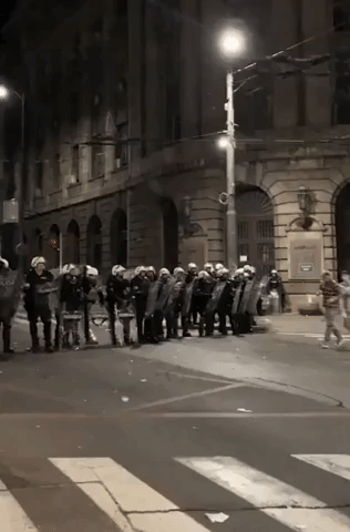 Protesters Dance in Front of Police in Belgrade