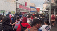 Large Group of Migrants Walk Through Tapachula, Mexico