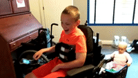 Boy Takes Sister for a Spin in New Wheelchair Trailer