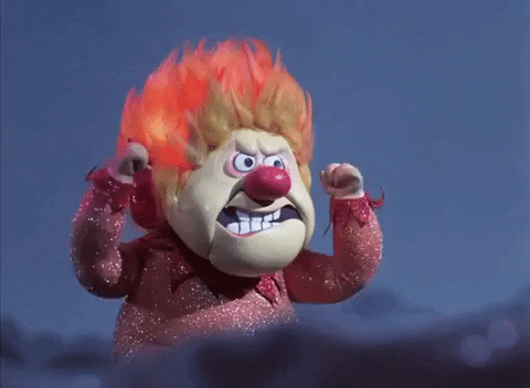 TV gif. Heat Miser from A Year Without Santa Claus shakes his fists in anger.