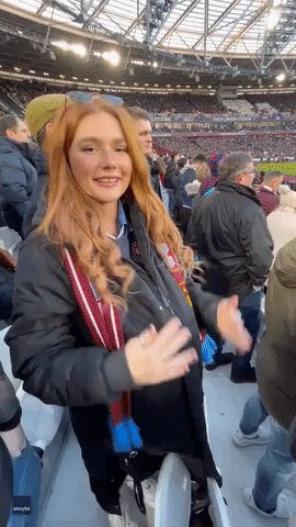 Soccer Fan Makes Valiant Attempt to Conceal Premier League Match Ball as Baby Bump