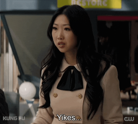 TV gif. Shannon Dang as Althea in Kung Fu winces and leans back as she says "yikes..." which appears as text.