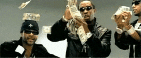 Celebrity gif. Puff Daddy making it rain while one comrade balances cash stacks on his head and the other fans out and waves a stack.