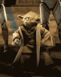 Star Wars gif. Yoda dancing, pumping his arms.