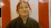 beabadoobee sad music video wink silly GIF