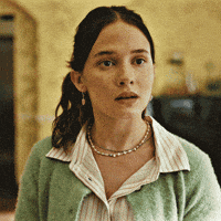 Cruisified reaction smile laugh awkward GIF