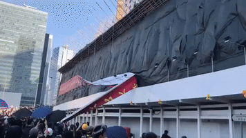 Protesters in Hong Kong Tear Down China National Day Banner and Throw Eggs at Xi Jinping Poster