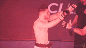 fight hug GIF by Karate Combat