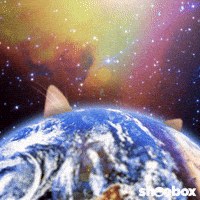 Digital art gif. A massive orange tabby cat in outer space peaks its curious head over the planet Earth. 