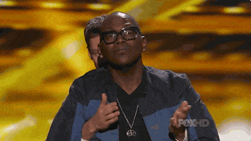 ryan seacrest laughing GIF by American Idol