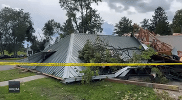 Cleanup Underway as Tornado Uproots Trees and Damages Buildings in Perry, Michigan