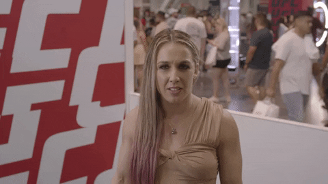 Celebrity gif. Vanessa Demopoulos frowns and recoils back slightly, grossed out.