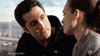 TV gif. Dominic Rains as Crockett puts his arm around Torrey DeVitto as Natalie on Chicago Med, as she leans her head on his shoulder and they rock back and forth.