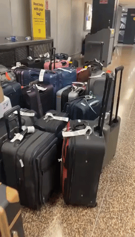 Luggage Piles Up Amid Flight Disruptions at Seattle-Tacoma Airport