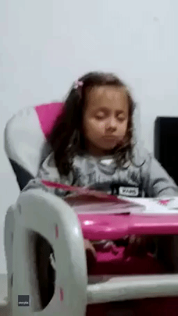 Sleepy Scholar: Colombian Girl Keeps Falling Asleep While Attempting Homework