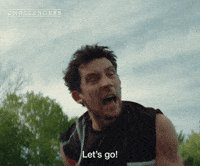 Movie gif. A shot from the movie "Challengers." Patrick Zweig pumps his fist and yells passionately. Caption reads, "Let's Go!"
