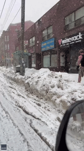 Bold Canadian Rollerblades Through Toronto Snow in Shorts