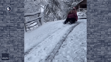 Florida Woman Struggles to Get to Grips With Sledding