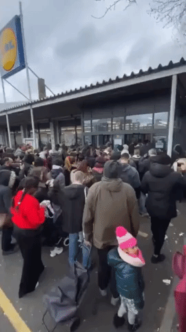 Shoppers Swarm Outside London Supermarket as Coronavirus Fuels Panic-Buying