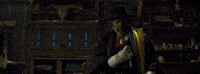 Looking Quentin Tarantino GIF