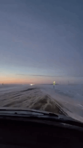Strong Winds Whip Up Snow Along Trans-Canada Highway Near Winnipeg