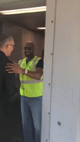 49ers Legend  Jerry Rice Greets Passengers at Miami Airport Ahead of Super Bowl