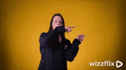 Wizzflix_ look yellow pointing right GIF