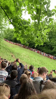 Canadian First-Timer Tumbles to Victory in British Cheese-Rolling Race