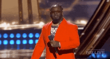 iheartradio music awards red suit GIF by iHeartRadio