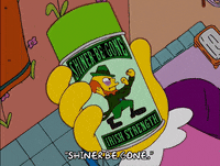 The Simpsons gif. Someone holds a green-capped can of “Irish strength shiner-be-gone” featuring a leprechaun holding up his fists, ready to fight. Text, “Shiner be gone.”