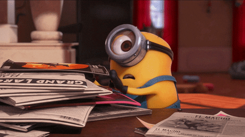 Despicable Me gif. A minion looks at us shocked and a bit worried. He then shrugs and his face changes to be unimpressed, and he walks away. 