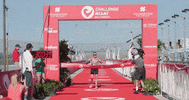 ProTriathletesOrg winner victory triathlon finish line GIF