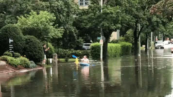 Kayaker Navigates Flash Floodwaters in Worcester, Massachusetts