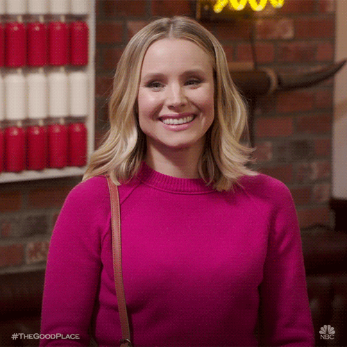 TV gif. Kristen Bell as Eleanor in The Good Place. She smiles broadly and looks very encouraging. She shoots someone a hearty, two-thumbs up. 