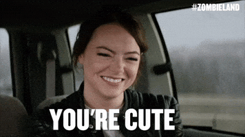 Movie gif. Emma Stone as Wichita in Zombieland snickers with a smile. Text, "You're cute."