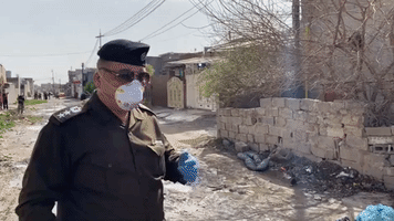Workers Disinfect House of Kirkuk Family Infected With Coronavirus