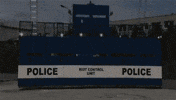 new police wall riot vehicle GIF