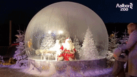 Santa Greets Children From Inside Giant Snow Globe in Denmark