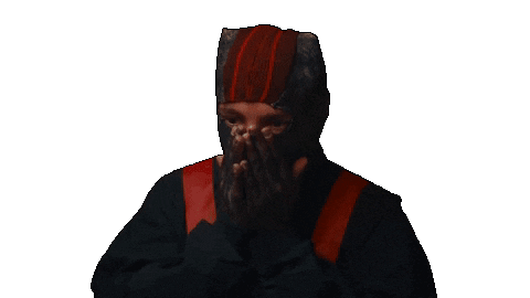 Sticker gif. Wearing a black beanie and cloak, Tyler Joseph of Twenty One Pilots suspiciously shifts his eyes and  grins at us.