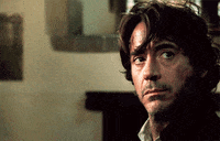 robert downey jr wink GIF