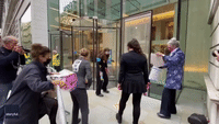 Extinction Rebellion Protesters Smash Windows at JP Morgan Office in London