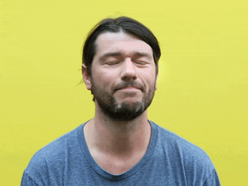 Video gif. A man scrunches his face in reluctant acceptance and nods his head, looking disappointed.