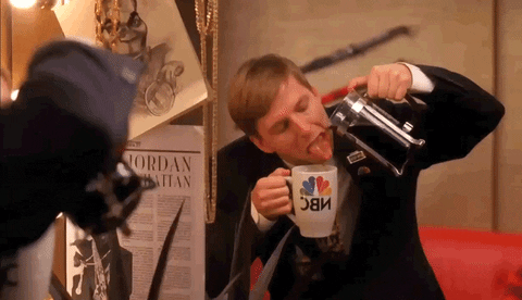 TV gif. Jack McBrayer as Kenneth on 30 Rock leaning in to drink coffee as he pours it from a French press into a mug.